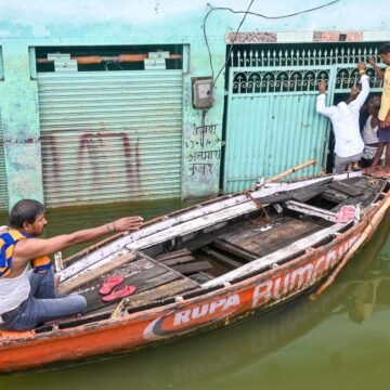 Man Navigates Floods by Boat to Celebrate Raksha Bandhan