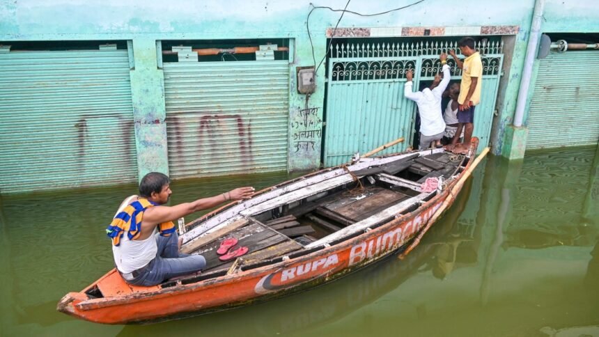 Man Navigates Floods by Boat to Celebrate Raksha Bandhan