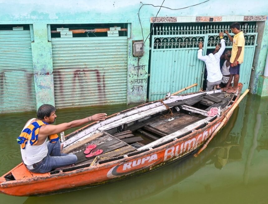 Man Navigates Floods by Boat to Celebrate Raksha Bandhan
